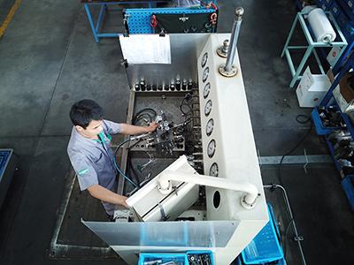 Hydraulic manifold block testing